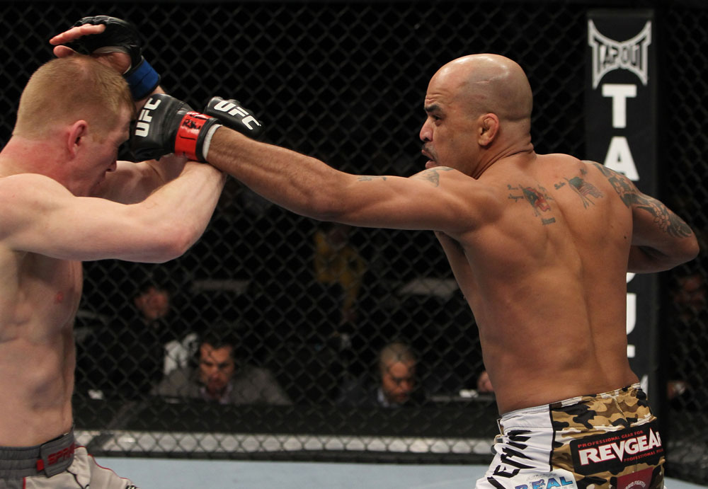 NASHVILLE, TN - JANUARY 20:  (R-L) Jorge Rivera punches Eric Schafer during the UFC on FX event at Bridgestone Arena on January 20, 2012 in Nashville, Tennessee.  (Photo by Josh Hedges/Zuffa LLC/Zuffa LLC via Getty Images)
