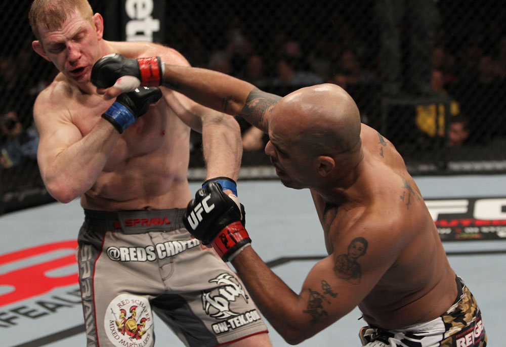 NASHVILLE, TN - JANUARY 20:  (R-L) Jorge Rivera punches Eric Schafer during the UFC on FX event at Bridgestone Arena on January 20, 2012 in Nashville, Tennessee.  (Photo by Josh Hedges/Zuffa LLC/Zuffa LLC via Getty Images)