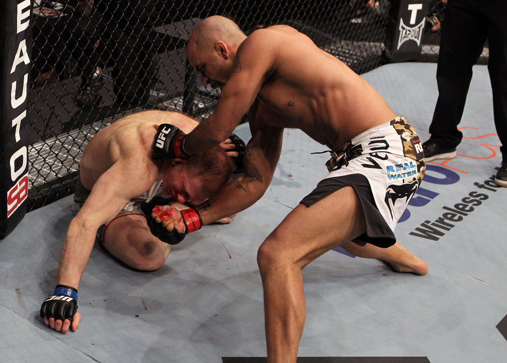 NASHVILLE, TN - JANUARY 20:  (R-L) Jorge Rivera punches Eric Schafer during the UFC on FX event at Bridgestone Arena on January 20, 2012 in Nashville, Tennessee.  (Photo by Josh Hedges/Zuffa LLC/Zuffa LLC via Getty Images)
