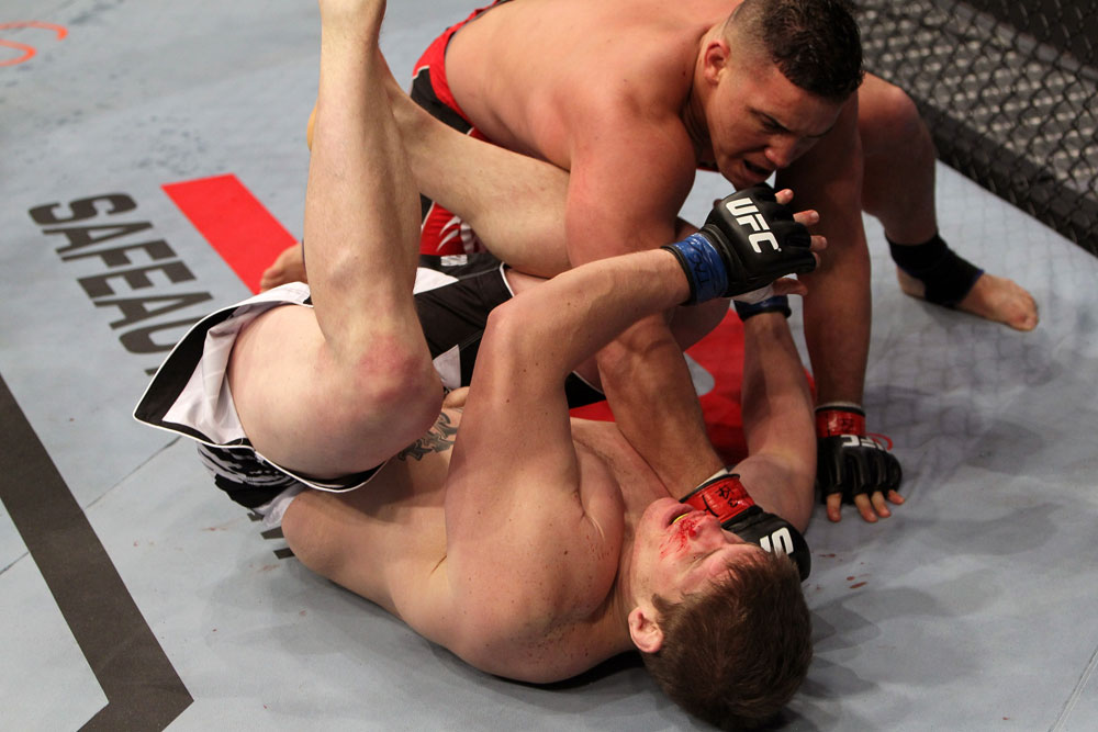 NASHVILLE, TN - JANUARY 20:  Pat Barry knocks out Christian Morecraft with a punch during the UFC on FX event at Bridgestone Arena on January 20, 2012 in Nashville, Tennessee.  (Photo by Josh Hedges/Zuffa LLC/Zuffa LLC via Getty Images)