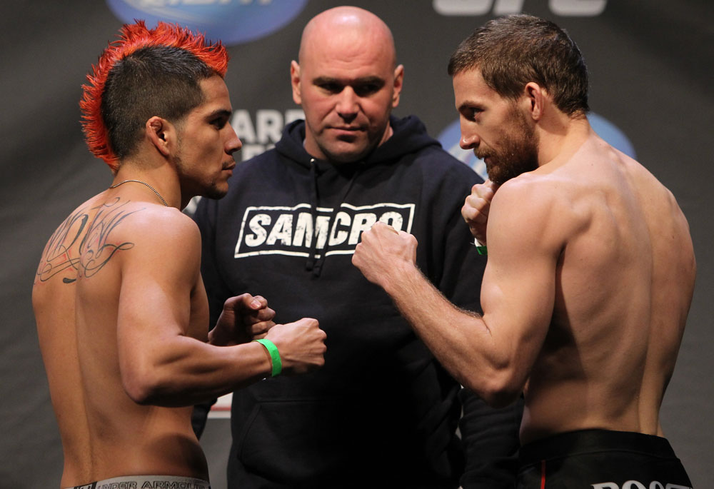 NASHVILLE, TN - JANUARY 19:  (L-R) Opponents Joseph Sandoval and Nick Denis face off after weighing in during the UFC on FX official weigh in at Bridgestone Arena on January 19, 2012 in Nashville, Tennessee.  (Photo by Josh Hedges/Zuffa LLC/Zuffa LLC via Getty Images)