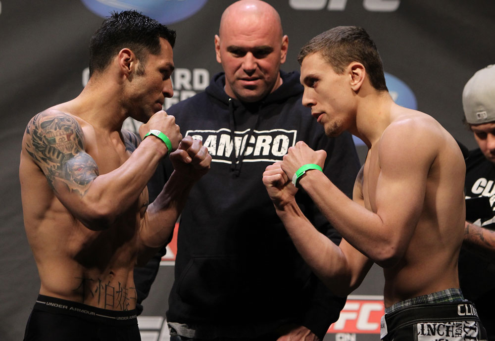 NASHVILLE, TN - JANUARY 19:  (L-R) Opponents Daniel Pineda and Pat Schilling face off after weighing in during the UFC on FX official weigh in at Bridgestone Arena on January 19, 2012 in Nashville, Tennessee.  (Photo by Josh Hedges/Zuffa LLC/Zuffa LLC via Getty Images)