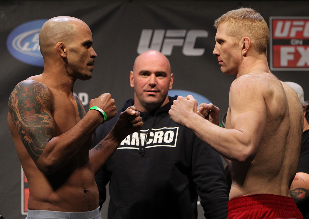 NASHVILLE, TN - JANUARY 19: (L-R) Opponents Jorge Rivera and Eric Schafer face off after weighing in during the UFC on FX official weigh in at Bridgestone Arena on January 19, 2012 in Nashville, Tennessee. (Photo by Josh Hedges/Zuffa LLC/Zuffa LLC via Getty Images)