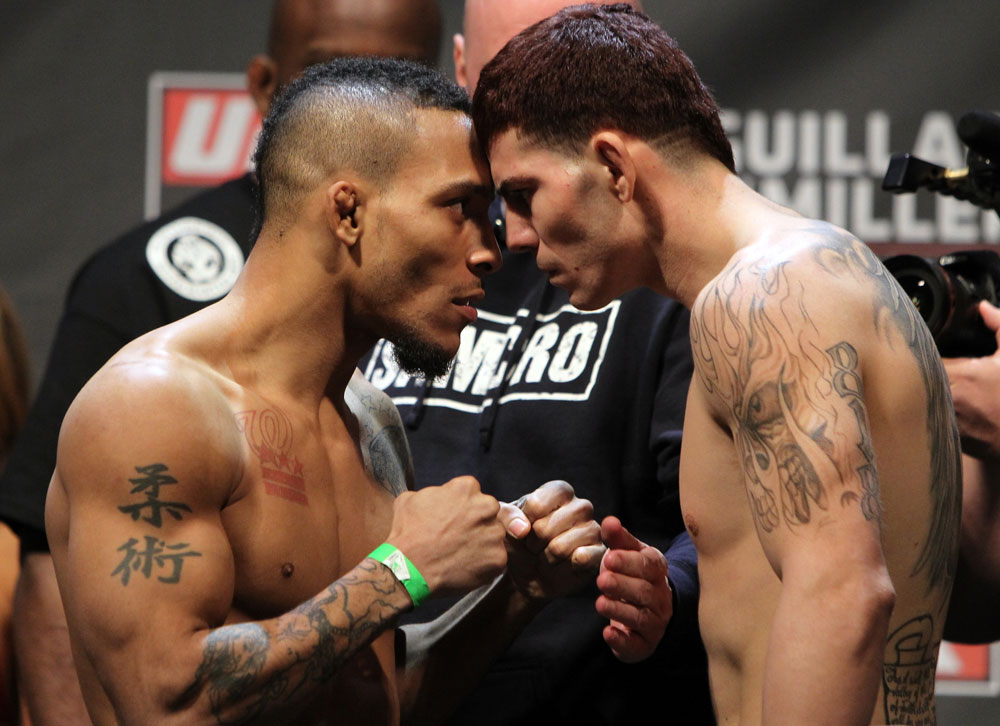 NASHVILLE, TN - JANUARY 19:  (L-R) Bantamweight opponents Mike Easton and Jared Papazian face off after weighing in during the UFC on FX official weigh in at Bridgestone Arena on January 19, 2012 in Nashville, Tennessee.  (Photo by Josh Hedges/Zuffa LLC/Zuffa LLC via Getty Images)