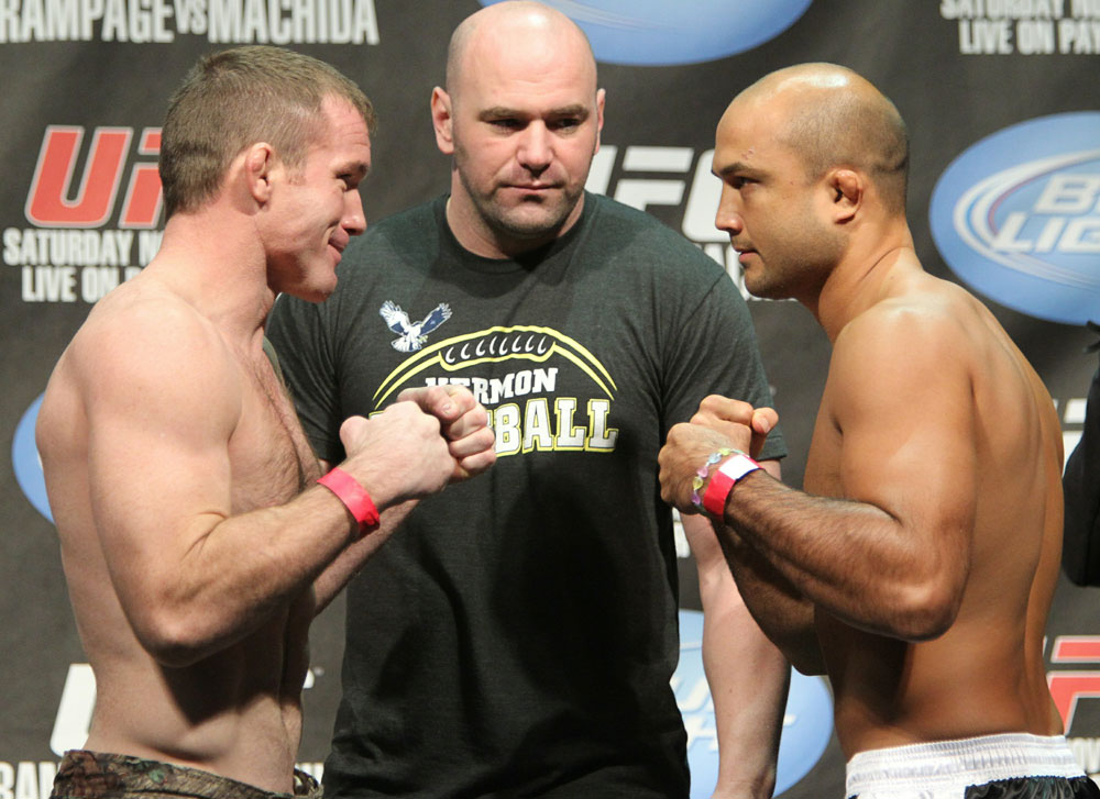 Welterweight opponents Matt Hughes (L) and BJ Penn (R) face off as UFC President Dana White looks on at the UFC 123 weigh-in at the Palace of Auburn Hills on November 19, 2010 in Auburn Hills, Michigan.  (Photo by Josh Hedges/Zuffa LLC/Zuffa LLC via Getty Images)