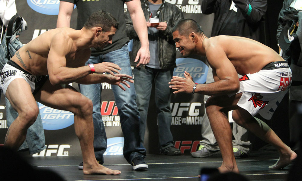 Middleweight opponents Aaron Simpson (L) and Mark Munoz (R) face off at the UFC 123 weigh-in at the Palace of Auburn Hills on November 19, 2010 in Auburn Hills, Michigan. (Photo by Josh Hedges/Zuffa LLC/Zuffa LLC via Getty Images)