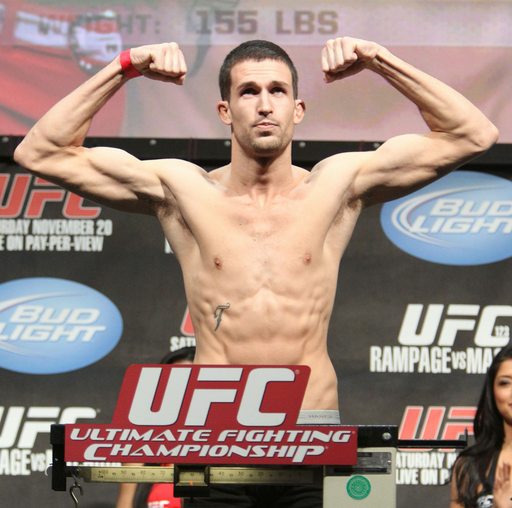 TJ O'Brien weighs in at 155 lbs at the UFC 123 weigh-in at the Palace of Auburn Hills on November 19, 2010 in Auburn Hills, Michigan.  (Photo by Josh Hedges/Zuffa LLC/Zuffa LLC via Getty Images)