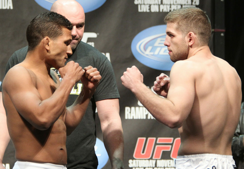 Lightweight opponents Paul Kelly (L) and TJ O'Brien (R) face off at the UFC 123 weigh-in at the Palace of Auburn Hills on November 19, 2010 in Auburn Hills, Michigan. (Photo by Josh Hedges/Zuffa LLC/Zuffa LLC via Getty Images)