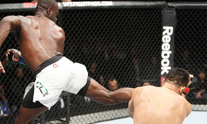 Uriah Hall of Jamaica lands a back kick to drop his opponent, Gegard Mousaasi of Iran in their middleweight bout during the UFC event at the Saitama Super Arena on September 27, 2015 in Saitama, Japan. (Photo by Mitch Viquez/Zuffa LLC)