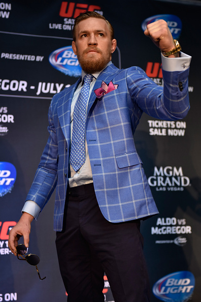 McGregor poses at Toronto press conference