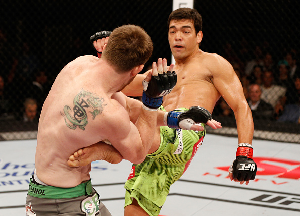 BARUERI, BRAZIL - DECEMBER 20: (R-L) Lyoto Machida of Brazil kicks CB Dollaway of the United States in their middleweight fight during the UFC Fight Night event inside the Ginasio Jose Correa on December 20, 2014 in Barueri, Brazil. (Photo by Josh Hedges/Zuffa LLC/Zuffa LLC via Getty Images)
