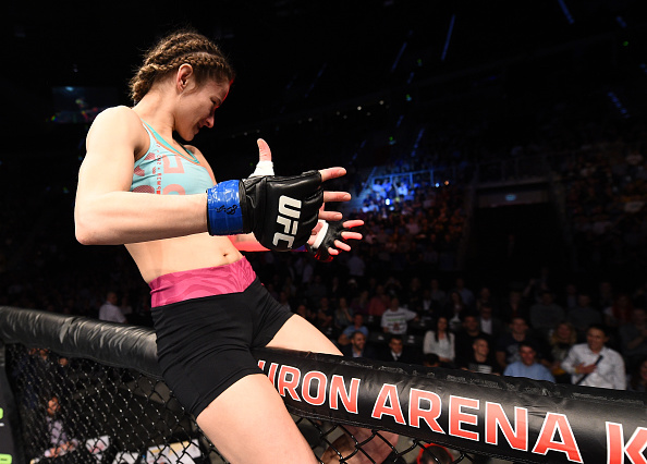 KRAKOW, POLAND - APRIL 11: (L-R) Maryna Moroz of Croatia has words for UFC Women's Strawweight Champion Joanna Jedrzejczyk in the crowd after her victory over Joanne Calderwood of Scotland in their women's strawweight fight during the UFC Fight Night event at the Tauron Arena on April 11, 2015 in Krakow, Poland. (Photo by Jeff Bottari/Zuffa LLC/Zuffa LLC via Getty Images)