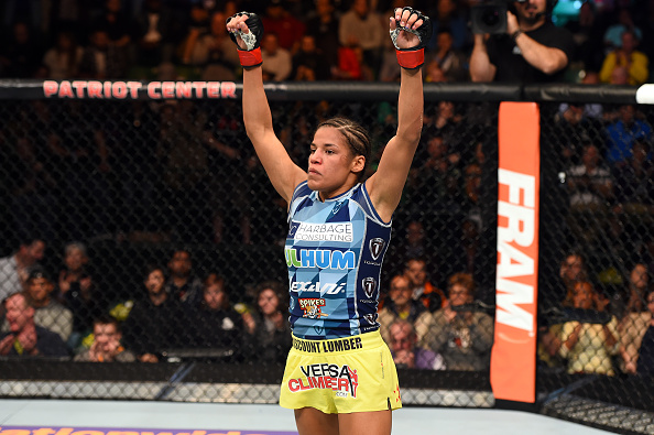 FAIRFAX, VA - APRIL 04: Juliana Pena celebrates after defeating Milana Dudieva in their women's bantamweight fight during the UFC Fight Night event at the Patriot Center on April 4, 2015 in Fairfax, Virginia. (Photo by Josh Hedges/Zuffa LLC/Zuffa LLC via Getty Images)