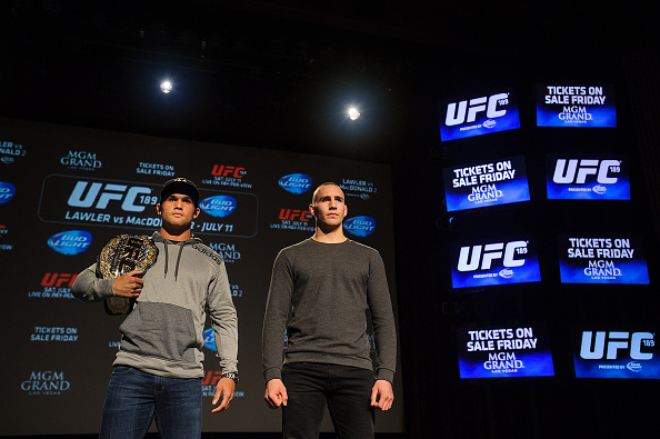 Lawler and MacDonald pose for a photo in Calgary