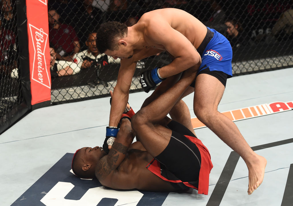 LAS VEGAS, NV - JULY 07: (R-L) <a href='../fighter/drakkar-klose'><a href='../fighter/drakkar-klose'>Drakkar Klose</a></a> punches <a href='../fighter/Marc-Diakiese'><a href='../fighter/Marc-Diakiese'>Marc Diakiese</a></a> of England in their lightweight bout during The Ultimate Fighter Finale at T-Mobile Arena on July 7, 2017 in Las Vegas, Nevada.  (Photo by Brandon Magnus/Zuffa LLC)