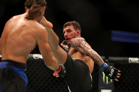 ANAHEIM, CA - JULY 29: Renato Moicano of Brazil kicks Brian Ortega in their featherweight bout during the UFC 214 event at Honda Center on July 29, 2017 in Anaheim, California. (Photo by Christian Petersen/Zuffa LLC/Zuffa LLC via Getty Images)
