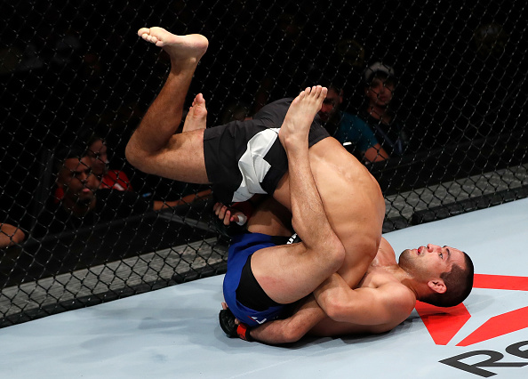 Joe Soto attempts to secure a guillotine choke submission against Rani Yahya during their bantamweight bout in March.
.